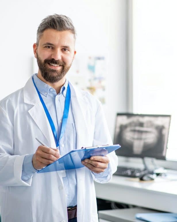 mature-dentist-in-modern-dental-surgery-looking-at-camera-pfmeaar6ugf64cxjyuv9wz3kwrgzbnaakfjaxkrax6.jpg